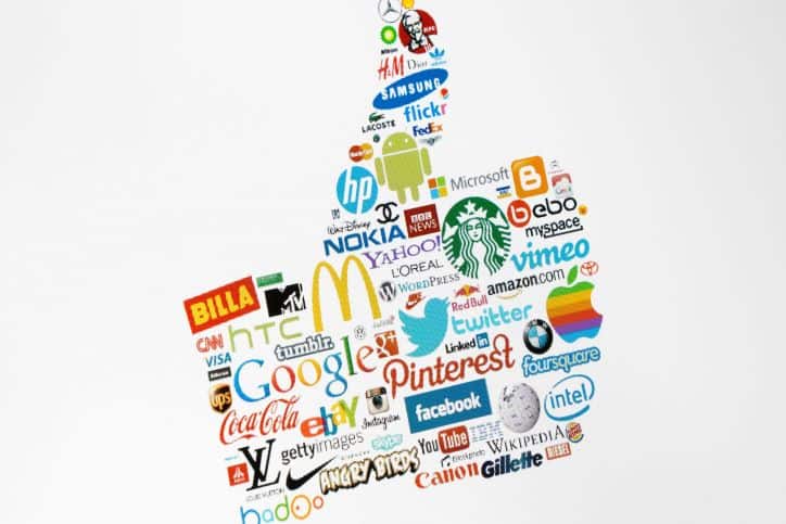 Thumbs up made with various big brand logos