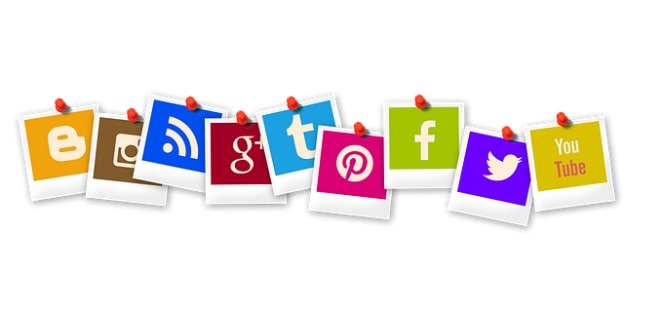 social media logo snapshots pinned to board