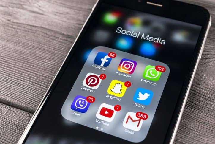 Social media folder with app icons | Cross channel marketing strategy