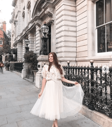 Alex Mills white dress | Microinfluencers with high engagement rates