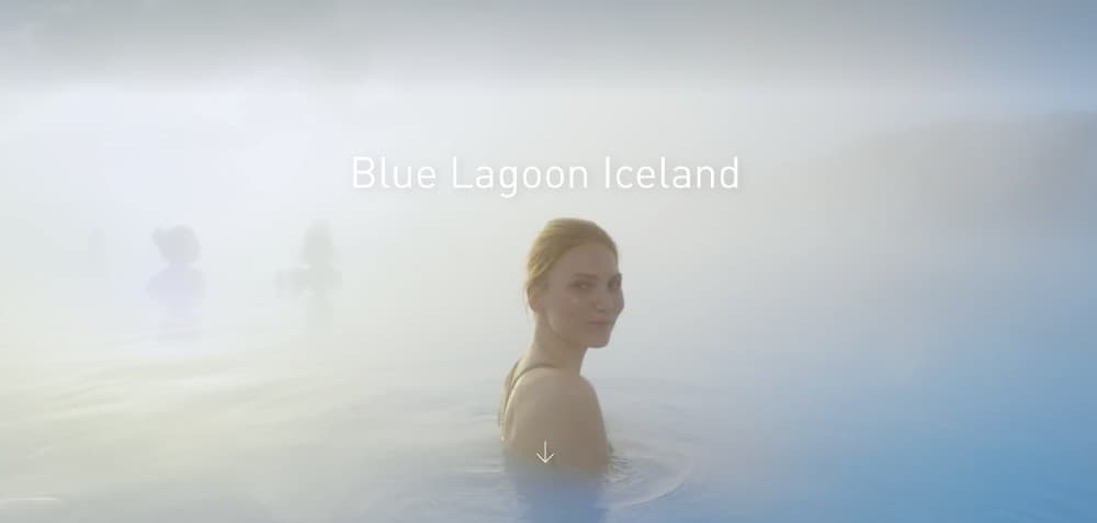 Woman bathing in the Blue Lagoon hot spring in Iceland