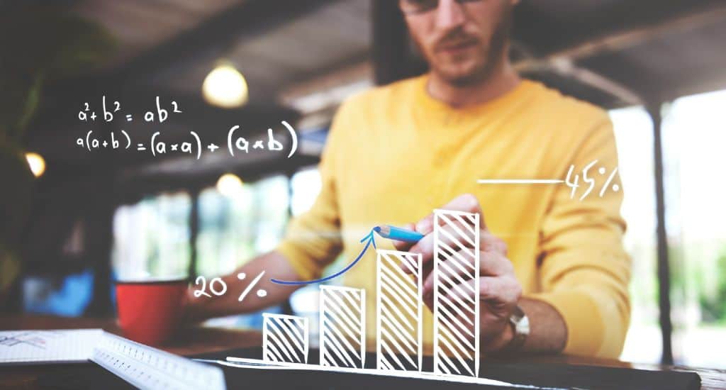 Man drawing graphs to calculate ROI from working with influencers