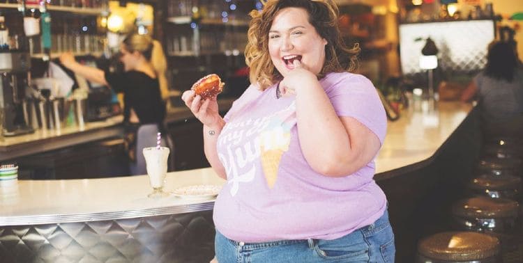 Corissa Enneking | Having a doughnut and milkshake at the bar