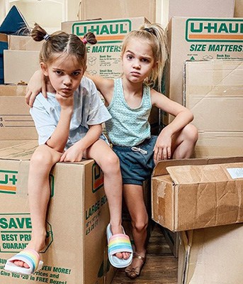 Gansta Pose on U-Haull Boxes | Emma Mila Stauffer