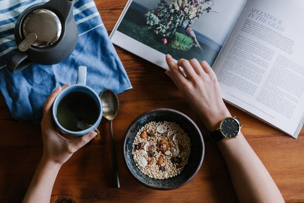 A food blogger creating content | Eating breakfast and reading a book