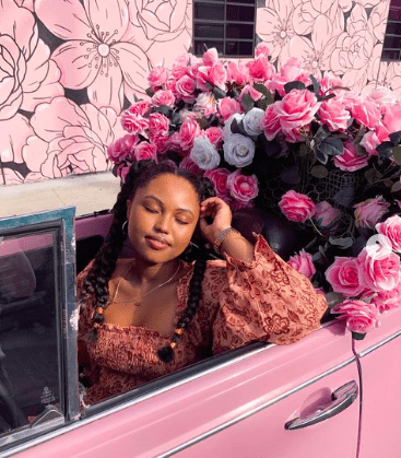 Lule DeShields pink car and roses