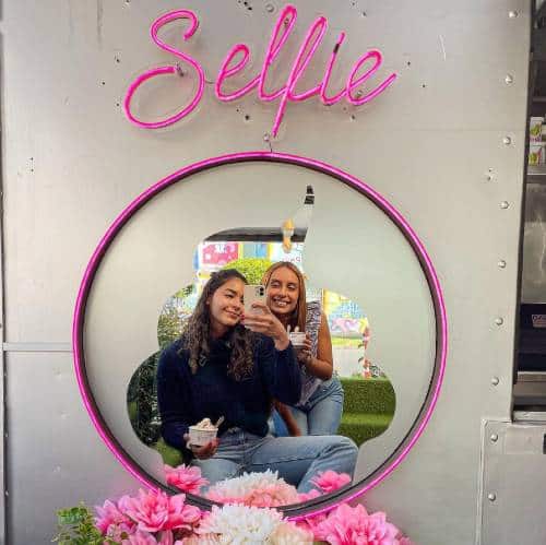 Maria Paula Rodriguez | Taking a photo through a selfie mirror