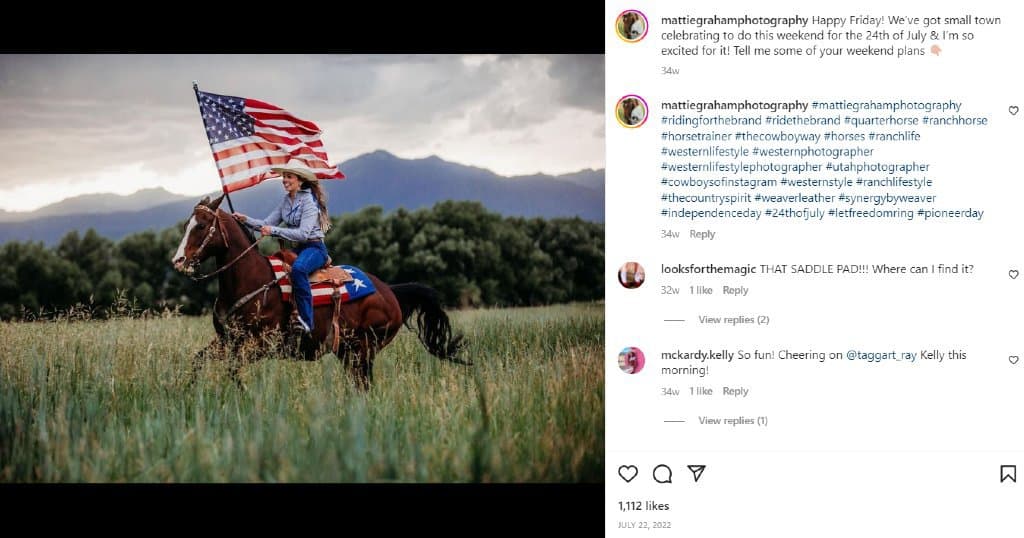 Mattie Mae riding a horse while hoisting up the American flag | Fashion bloggers in Utah