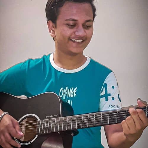 Rohan Tilaganji playing guitar | Dancer and Singer on Social Media