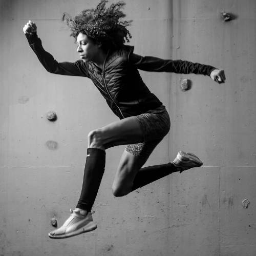 Woman Leaping in the Air | Wearable Weights