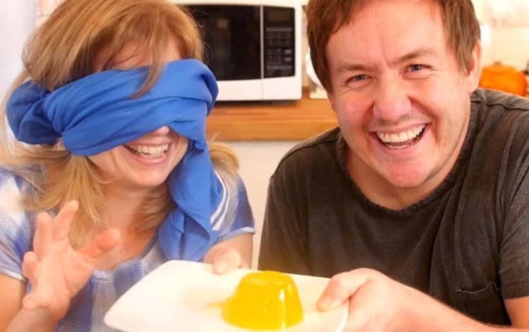 Food bloggers playing What Am I Eating with one person blindfolded