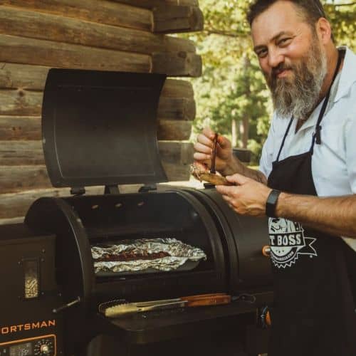 Reality TV Star Willie Robertson cooking on the BBQ